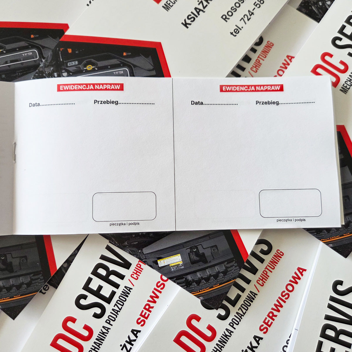 Książki serwisowe z logo